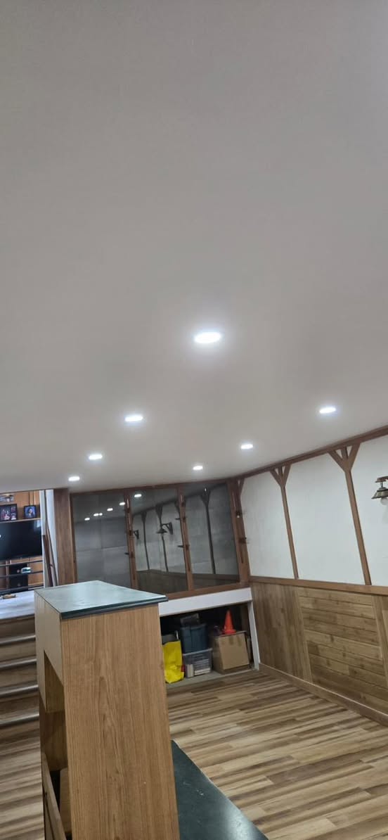 Finished basement with recessed lighting